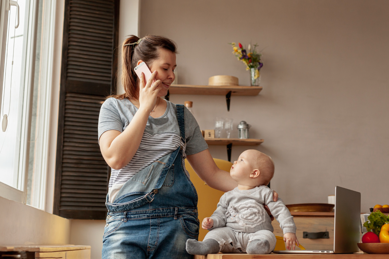 Mother on the phone with her baby