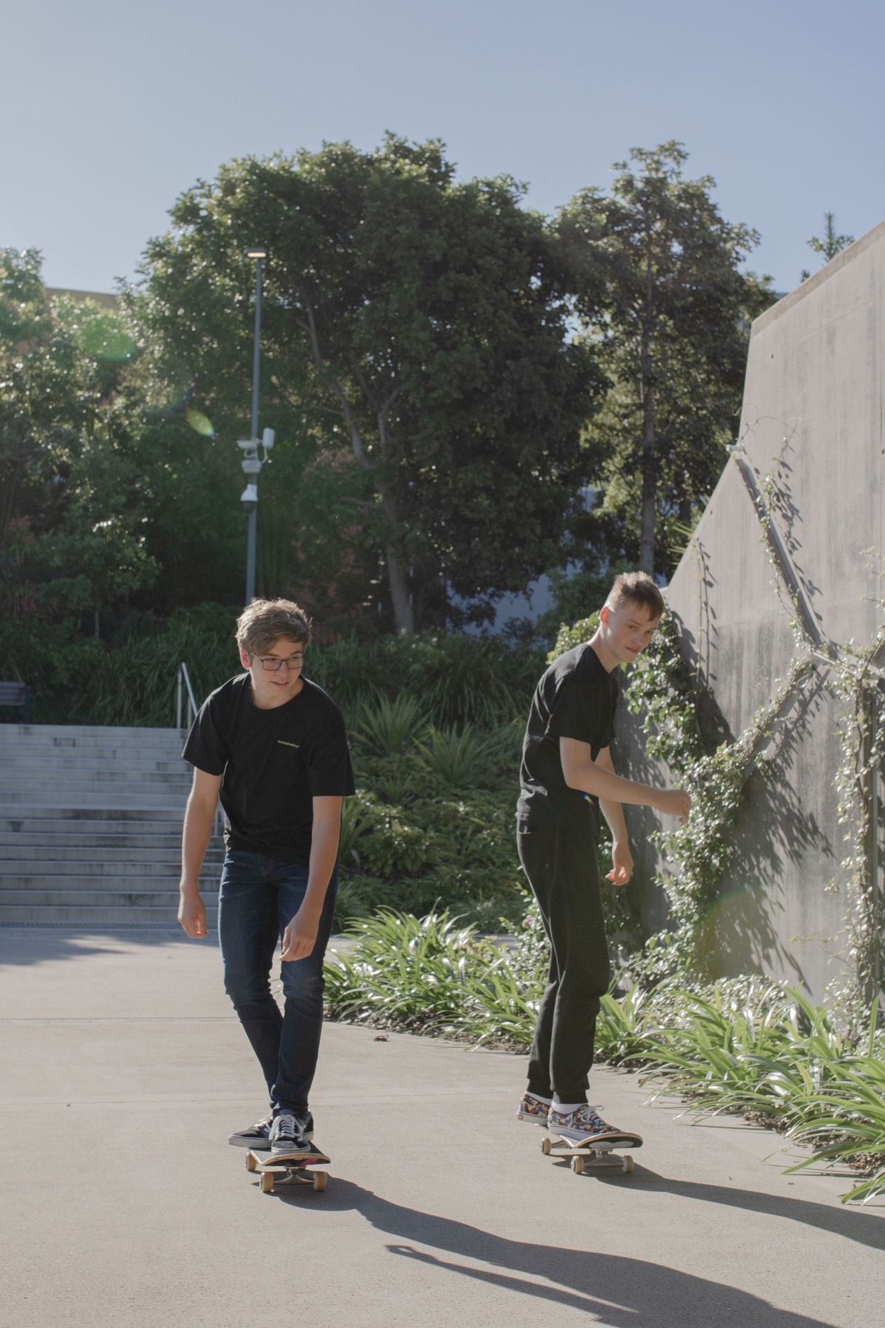 Young people skateboarding together
