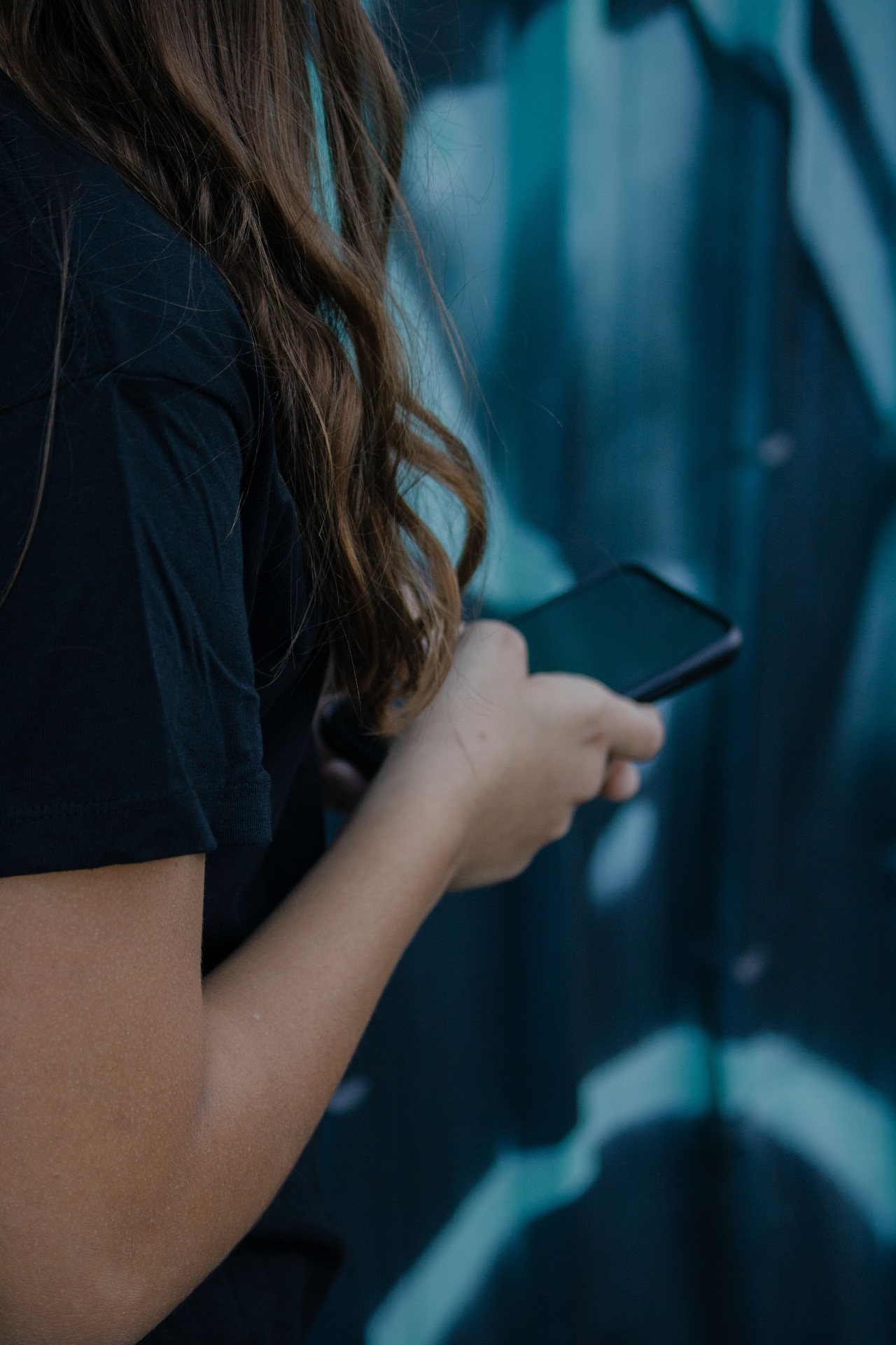 Person texting for mental health support